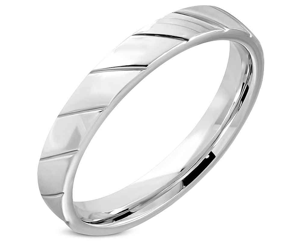 Smal mönstrad ring. Bredd cirka 4 mm.