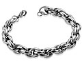 Grovt armband i stål. Mått cirka  23 cm x 11 mm.