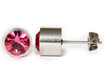 Rosa örhängen 8 mm i diameter och cirka 7 mm i höjd.