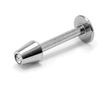 Piercingsmycke i kirurgiskt stål. Tjocklek cirka 1,2 mm, längd cirka 8 mm.